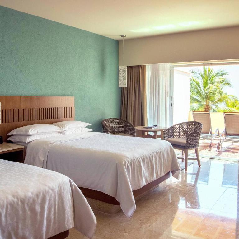 Sheraton Buganvilias Puerto Vallarta - Habitación con vistas a la terraza - Piso inferior - 2 camas dobles - 3
