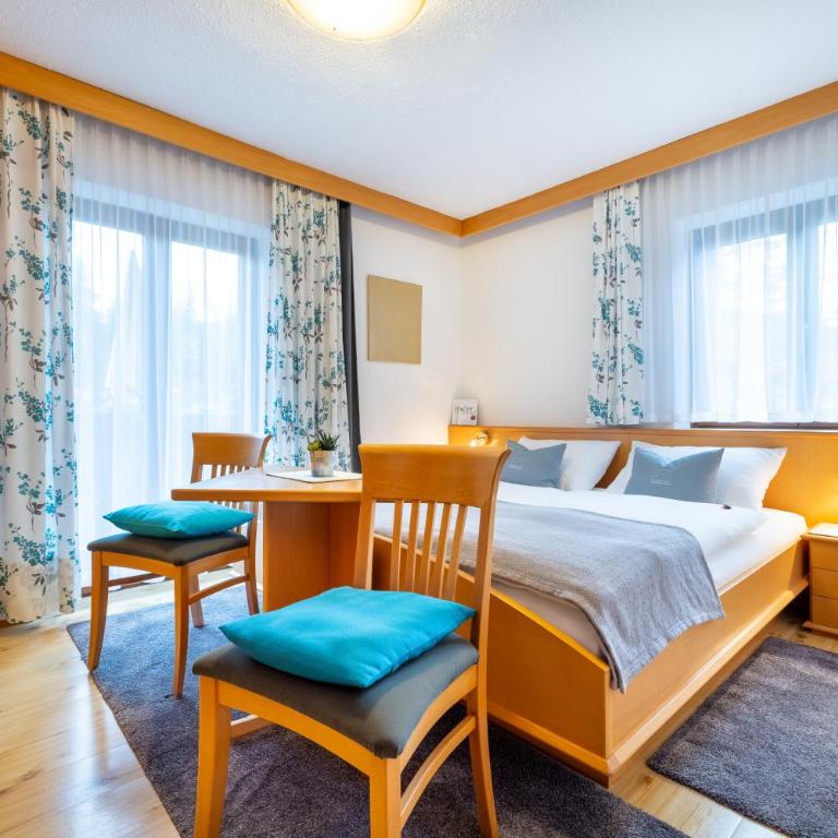 Sportpension Bergblick - Apartment mit 4 Schlafzimmern und einem Balkon - 12