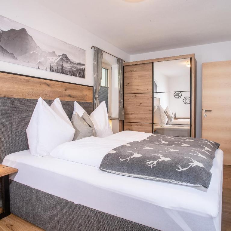Apart Dahoam - Premium Apartment mit 3 Schlafzimmern und Gartenblick - 4