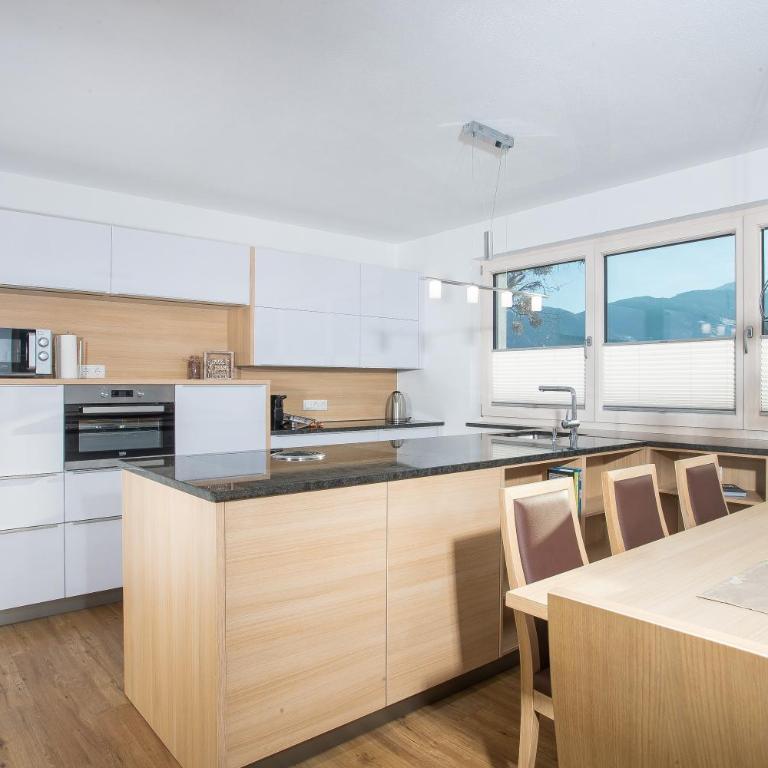 Apart Dahoam - Premium Apartment mit 3 Schlafzimmern und Gartenblick - 17