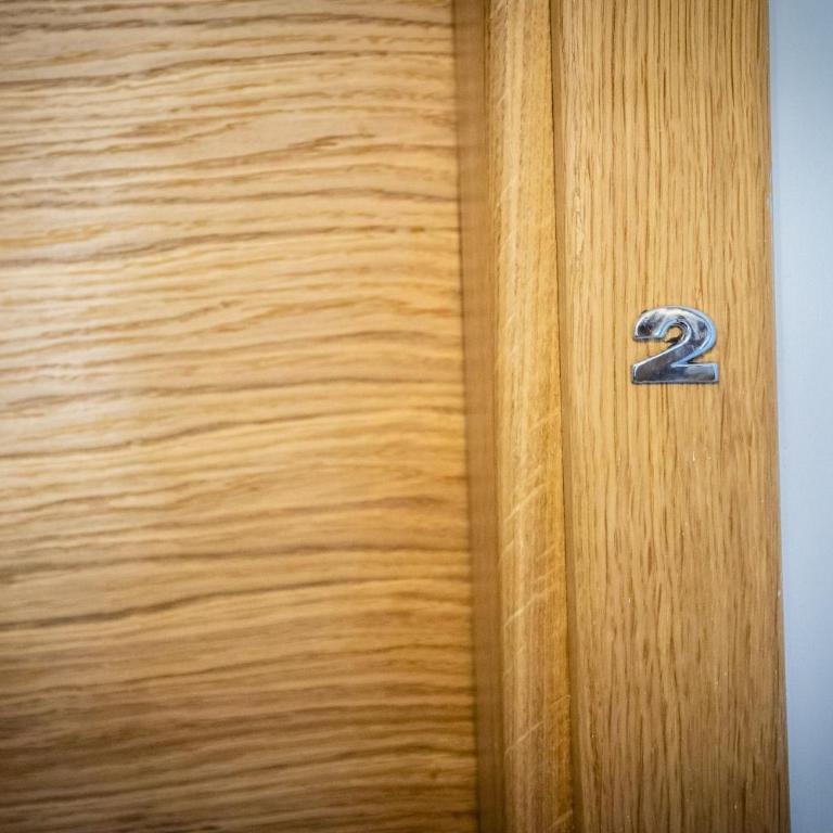 Gray brick - One-Bedroom Apartment - 2