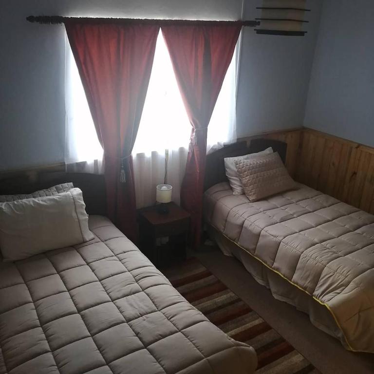 Hostal y Cabañas Vientos del Sur - Twin Room - 1