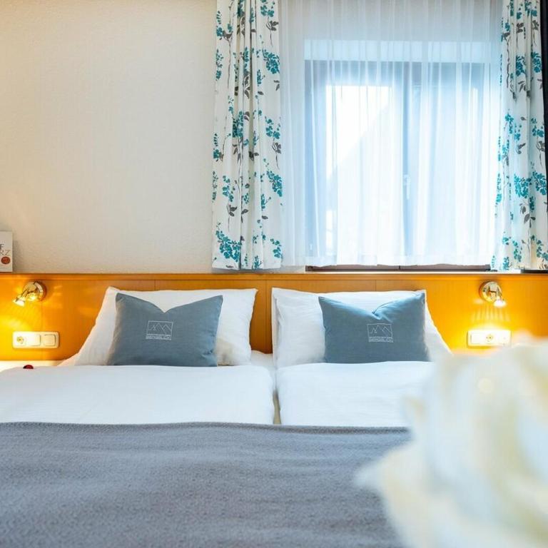Sportpension Bergblick - Apartment mit 4 Schlafzimmern und einem Balkon - 21