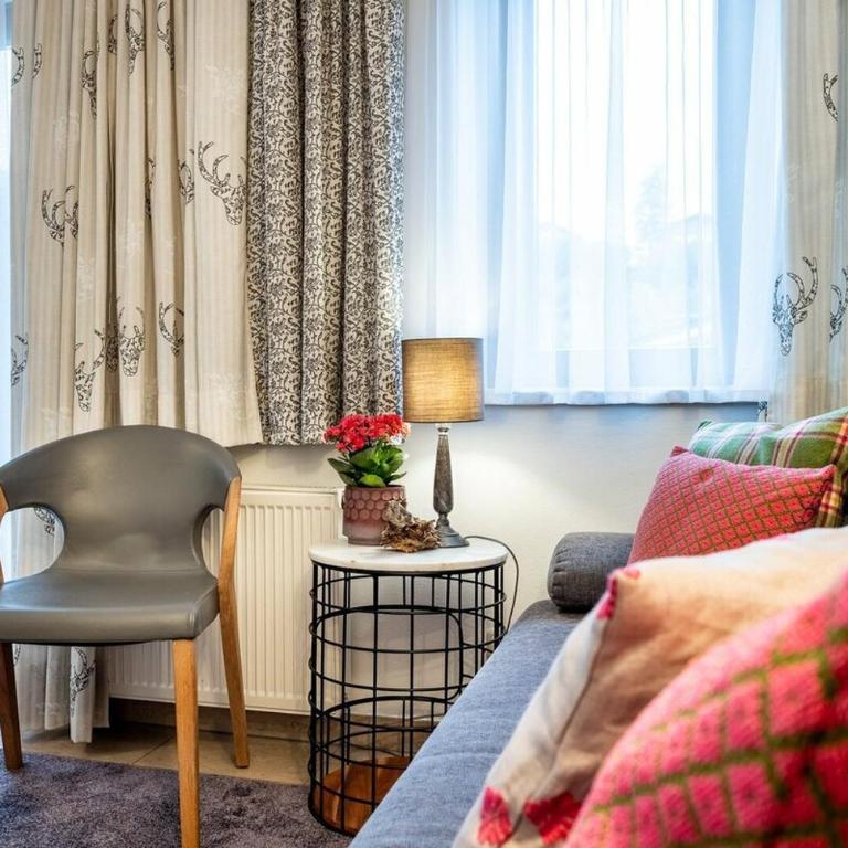 Sportpension Bergblick - Apartment mit 4 Schlafzimmern und einem Balkon - 18