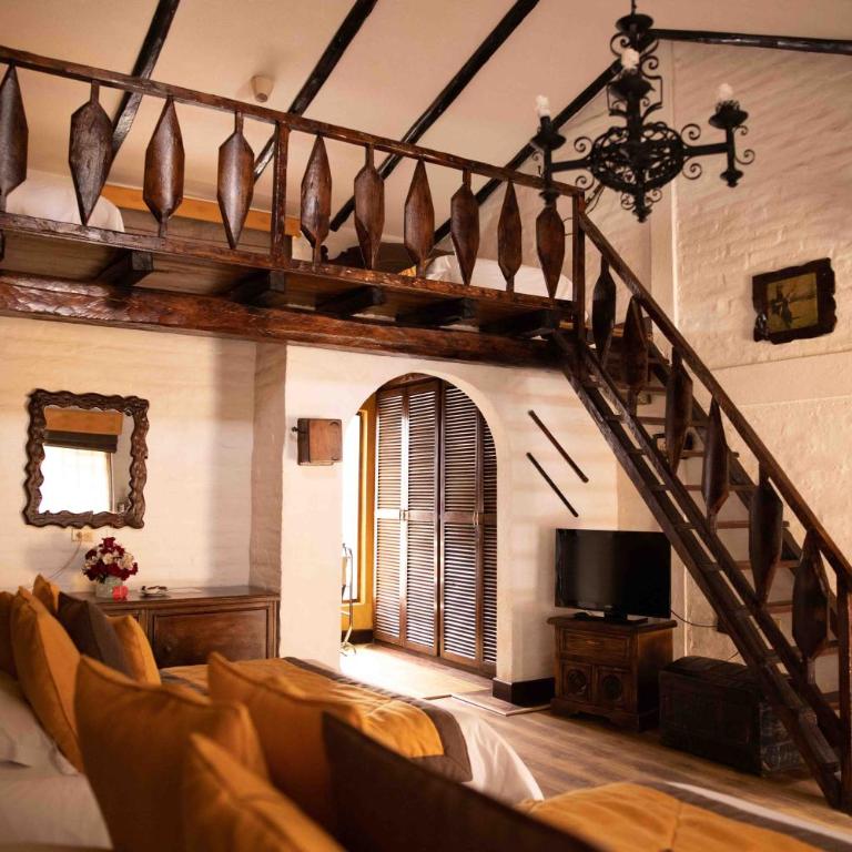 Hosteria Rumipamba De Las Rosas - Habitación cuádruple - 8