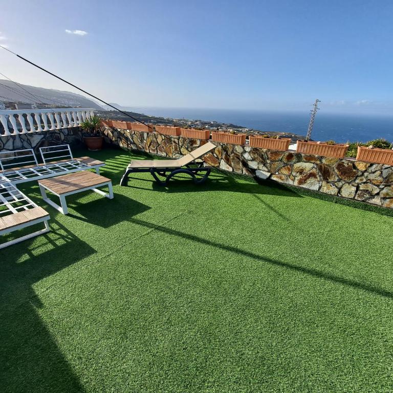 Tenerife apartment 100m2 CASA DE DON QUIJOTE with a terrace of 100m2 with a view of the ocean and Teide volcano and a garden of 600m2 - Two-Bedroom Apartment - 1