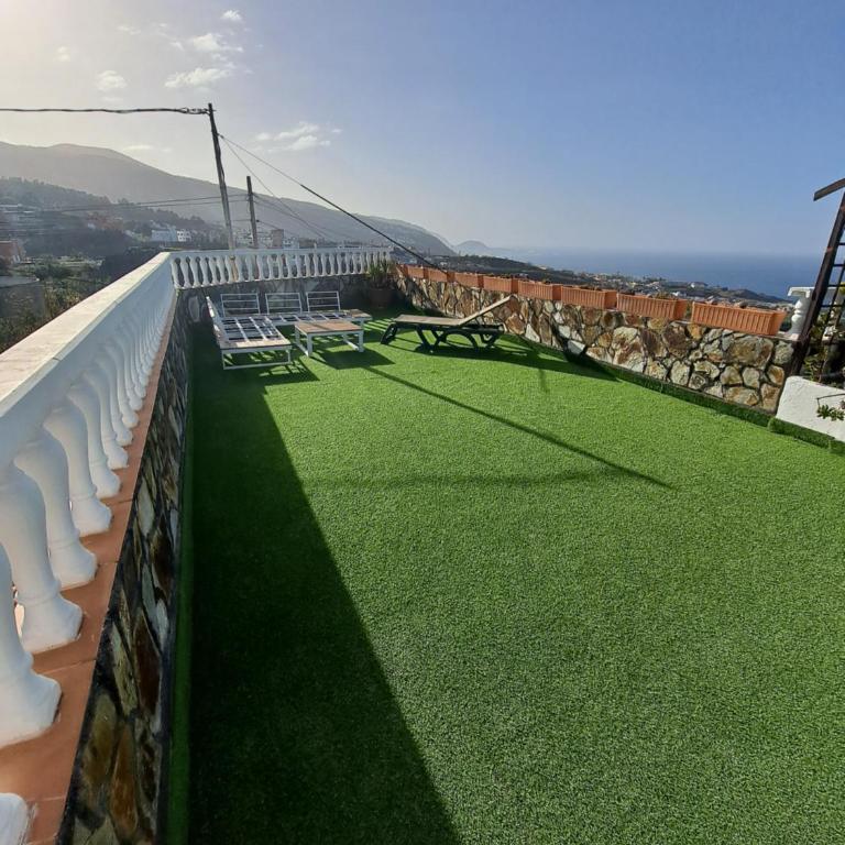 Tenerife apartment 100m2 CASA DE DON QUIJOTE with a terrace of 100m2 with a view of the ocean and Teide volcano and a garden of 600m2 - Two-Bedroom Apartment - 6