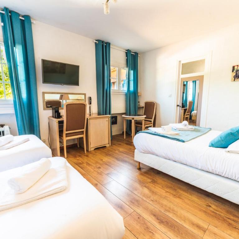 Logis Hôtels La Bastide des Golfs - Chambre Quadruple - Vue sur Jardin - 4