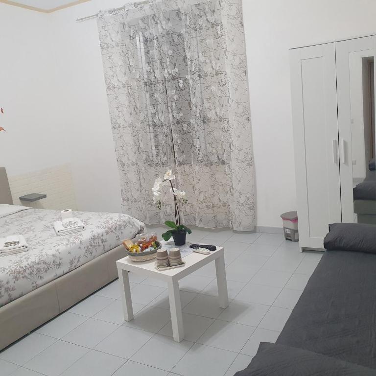Le tre orchidee - Camera Matrimoniale con Bagno in Comune - 14