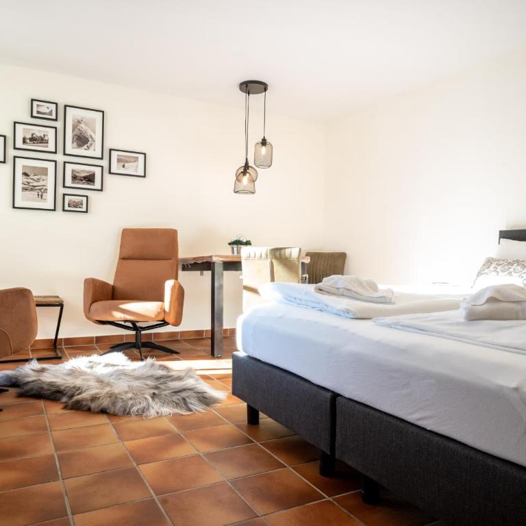 Landhaus Lodges Kaprun by we rent - Apartment mit Poolblick - 4