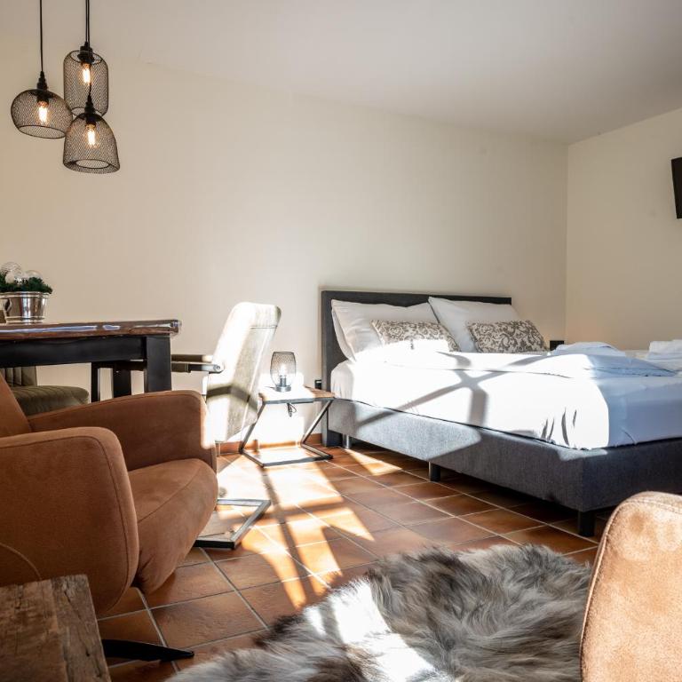 Landhaus Lodges Kaprun by we rent - Apartment mit Poolblick - 2