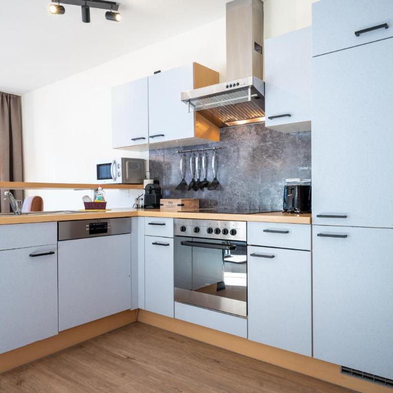 Landhaus Lodges Kaprun by we rent - Apartment mit Balkon - 15