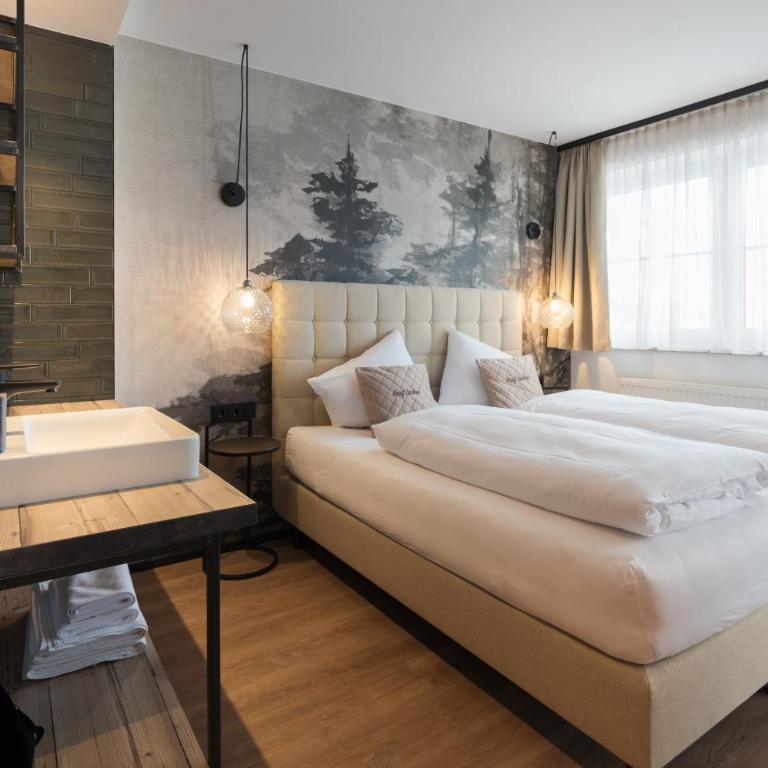 Alpendorf Hotel Stern - Deluxe Doppelzimmer mit Balkon - 1