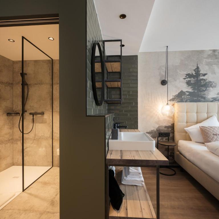 Alpendorf Hotel Stern - Deluxe Doppelzimmer mit Balkon - 5