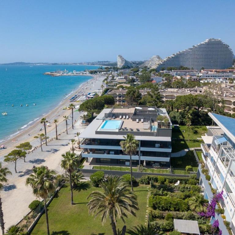 Appartement climatisé les pieds dans l'eau pour 6 personnes avec 1 suite parentale, 1 chambre double et 1 mini chambre Piscine sur le toit clim garage - Appartement 3 Chambres - 25
