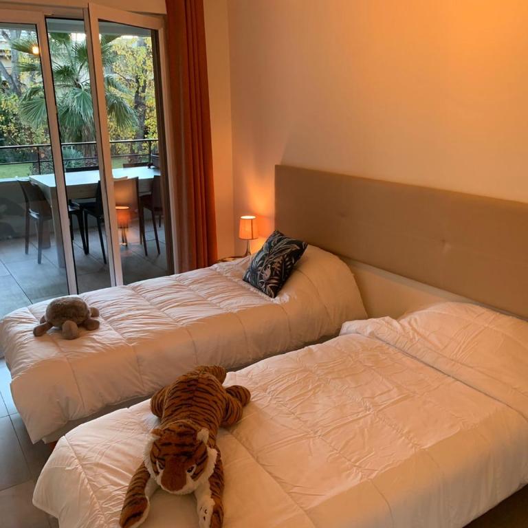 Appartement climatisé les pieds dans l'eau pour 6 personnes avec 1 suite parentale, 1 chambre double et 1 mini chambre Piscine sur le toit clim garage - Appartement 3 Chambres - 29
