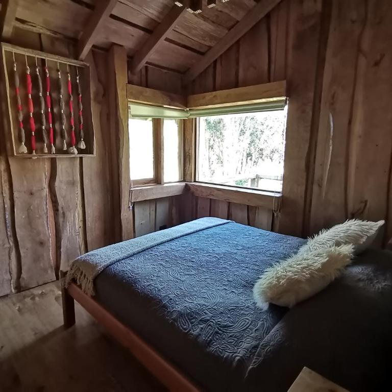 Cabana rustica 2 maravillosa,con troncos nativos, con orilla de Rio Trancura - Casa - 34