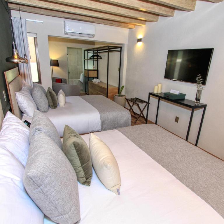 Casa Florencia Hotel Boutique - Deluxe Queen Suite - 1