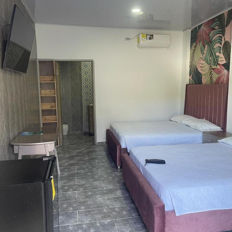 Apartamentos Isla Tropical - Habitación Cuádruple Deluxe - 4