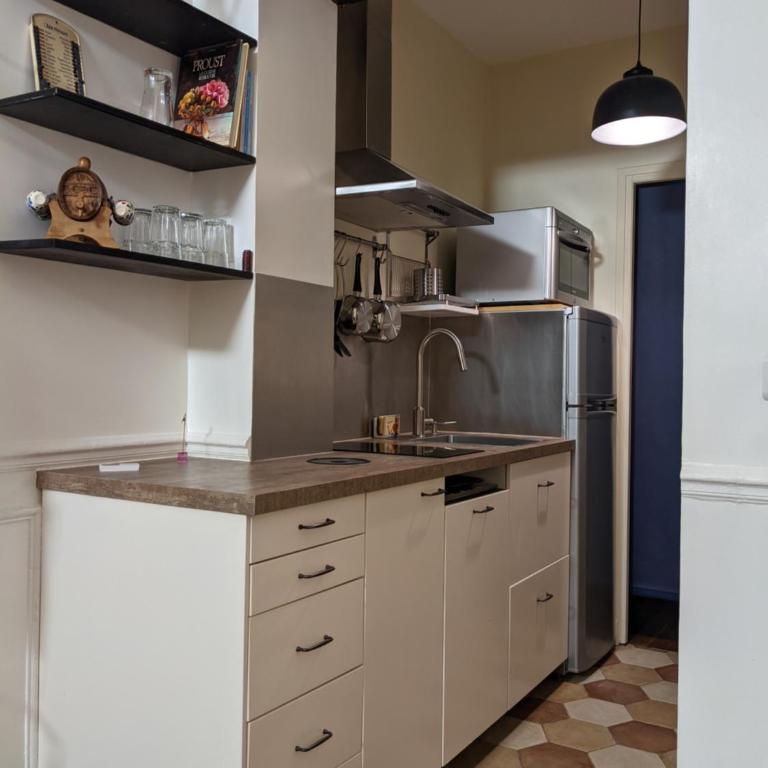Private acces to the all flat. Charming Parisian. - Chambre Quadruple avec Salle de Bains Privative - 7