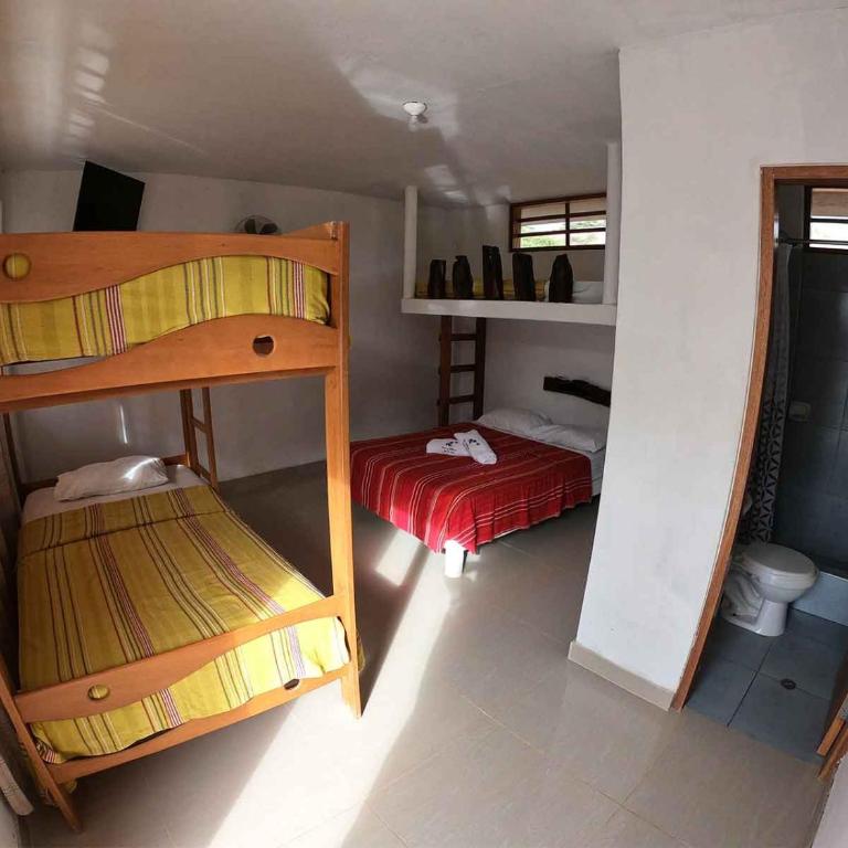 Huluwaju Hotel - Habitación Cuádruple - vistas al jardín - 4