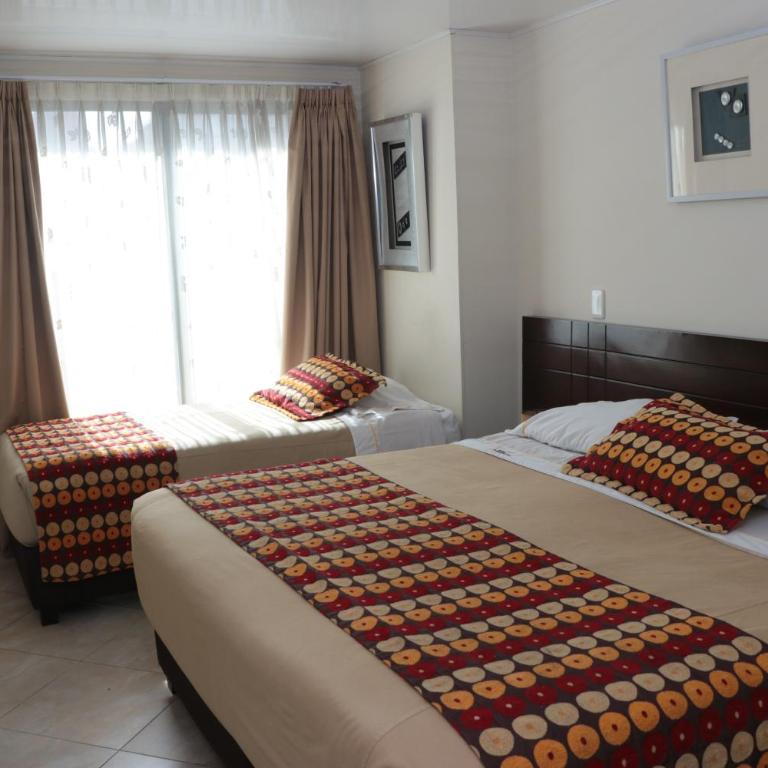 Hoteles Bogotá Inn Lago Chico Zona Rosa - Habitación Triple - 1