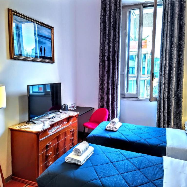NIK Rooms - Petite Chambre Double ou Lits Jumeaux - 6