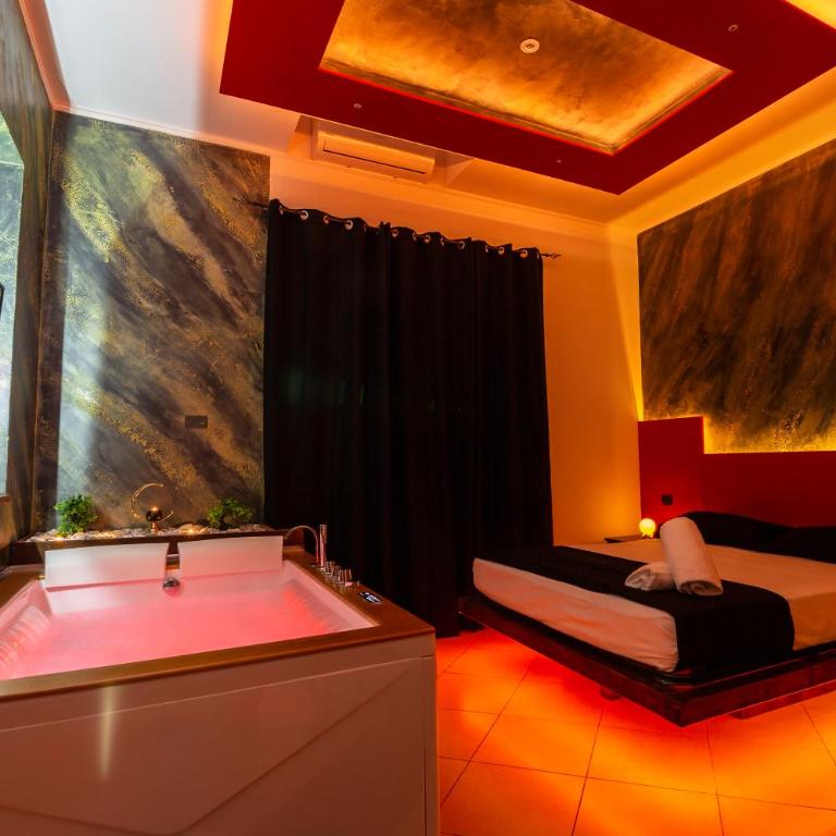 Pompei Luxury Rooms - Suite Queen con Vasca Idromassaggio - 1