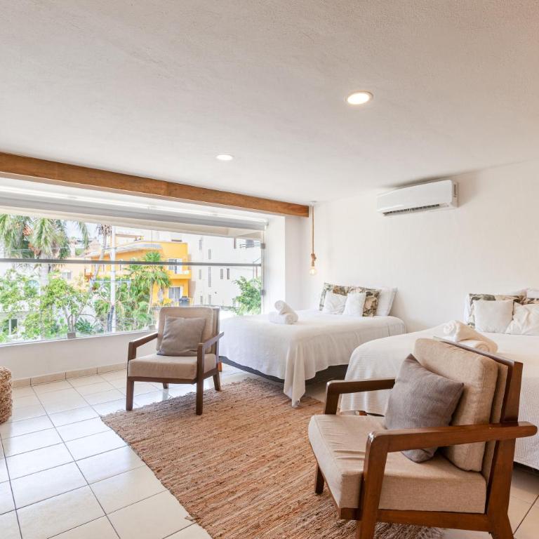 Ocean Plaza by Zamá Homes - One-Bedroom Apartment with Street View - 1