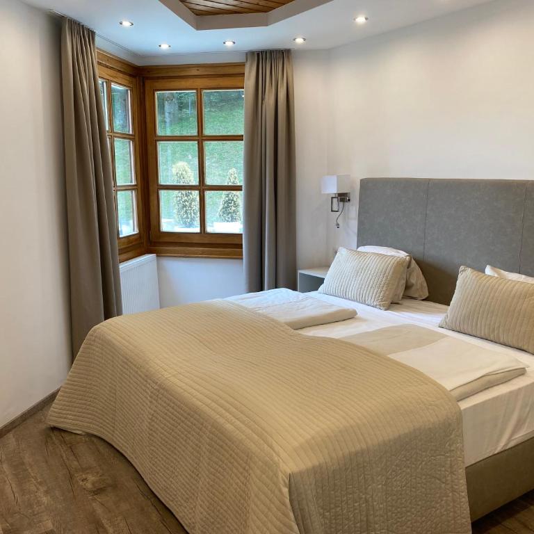 Hotelresort Klopeinersee - Suite mit Queensize-Bett und Whirlpool - 7
