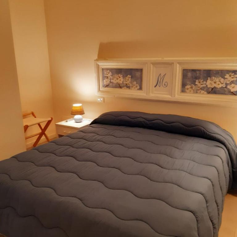 San Domenico Casa Vacanze - Camera Matrimoniale con Letto Supplementare - 17