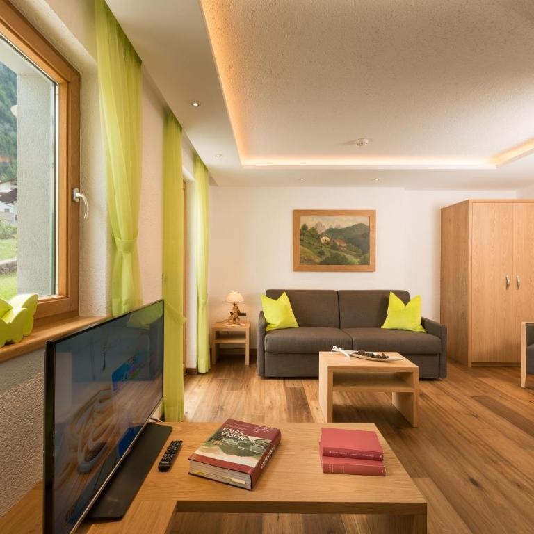 Alpin Sport - Appartamento con 2 Camere da Letto e Accesso Giardino - 4