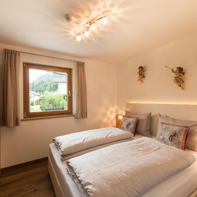 Alpin Sport - Appartamento con 2 Camere da Letto e Accesso Giardino - 13