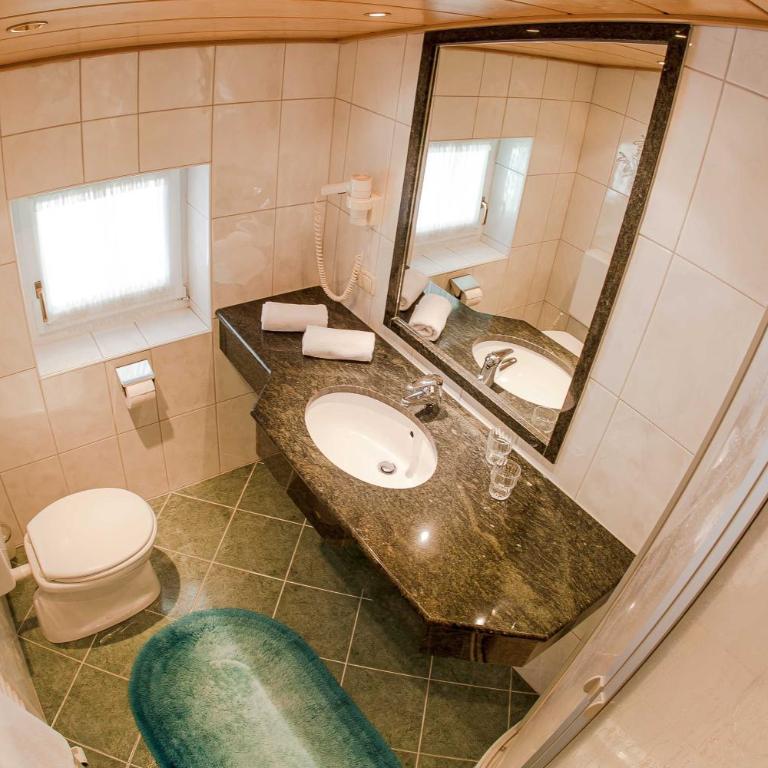 Apartpension Kappacher - Comfort Doppelzimmer mit Balkon - 2 Erwachsene und 1 Kind - 8