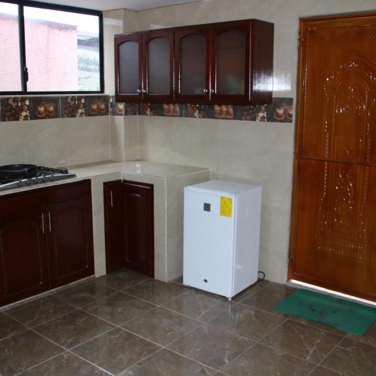 Hostal Flor de los Ángeles Guamote - Superior Suite - 5