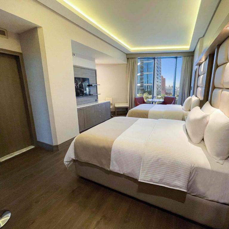 Safi Royal Luxury Metropolitan - Habitación Doble Deluxe - 2 camas dobles - 4