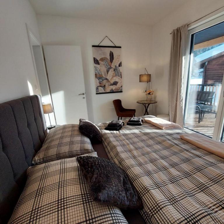Boutique-Apartments Familie Jarosch Fieberbrunn "Freier Eintritt in das örtliche Hallenbad inklusive Saunalandschaft oder zum Badesee" - Two-Bedroom Apartment with Bath - 6