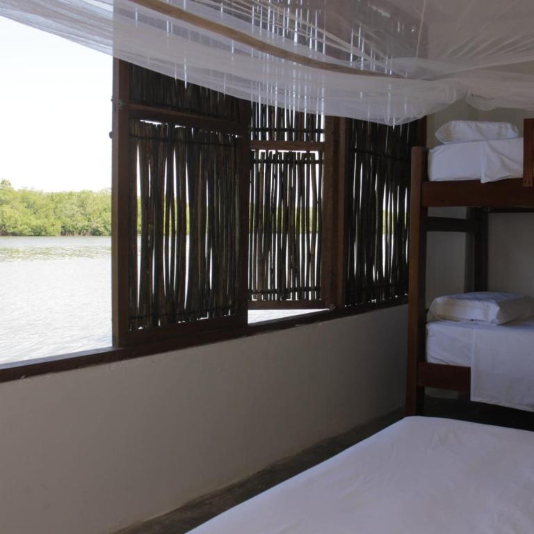 Hostal Casa en la Ciénaga Rincon del Mar - Habitación Cuádruple con vistas al lago - 1