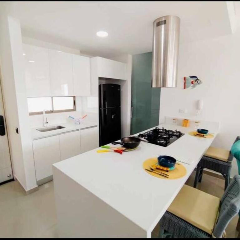 Exclusivo club de playa con acceso directo a la playa de pozos colorados, cuenta con piscinas olímpicas, para niños, restaurante, jacuzzi, sauna, turco, salón de juegos, simulador de golf, spa, transporte interno, bar, etc. - Apartamento de 2 dormitorios - 21