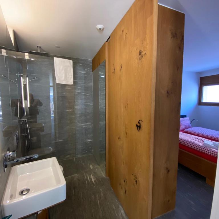 Casa Admisa, spektakuläre Aussicht, Ski in and out, hochwertige Einrichtung, Valserstein und Eiche - Apartment mit 2 Schlafzimmern - 18