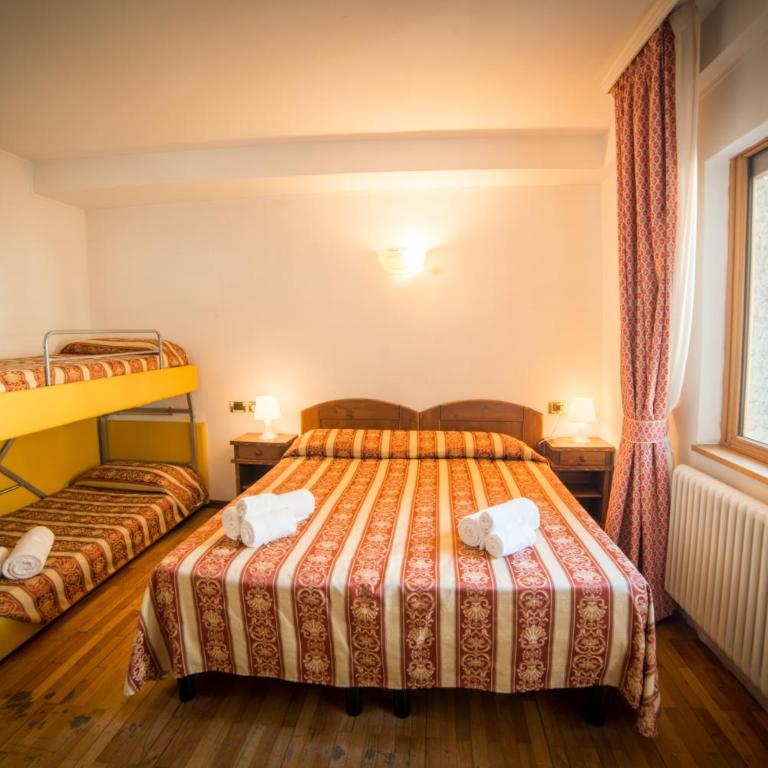 HG Hotel Italia - Camera Quadrupla Classic - 7