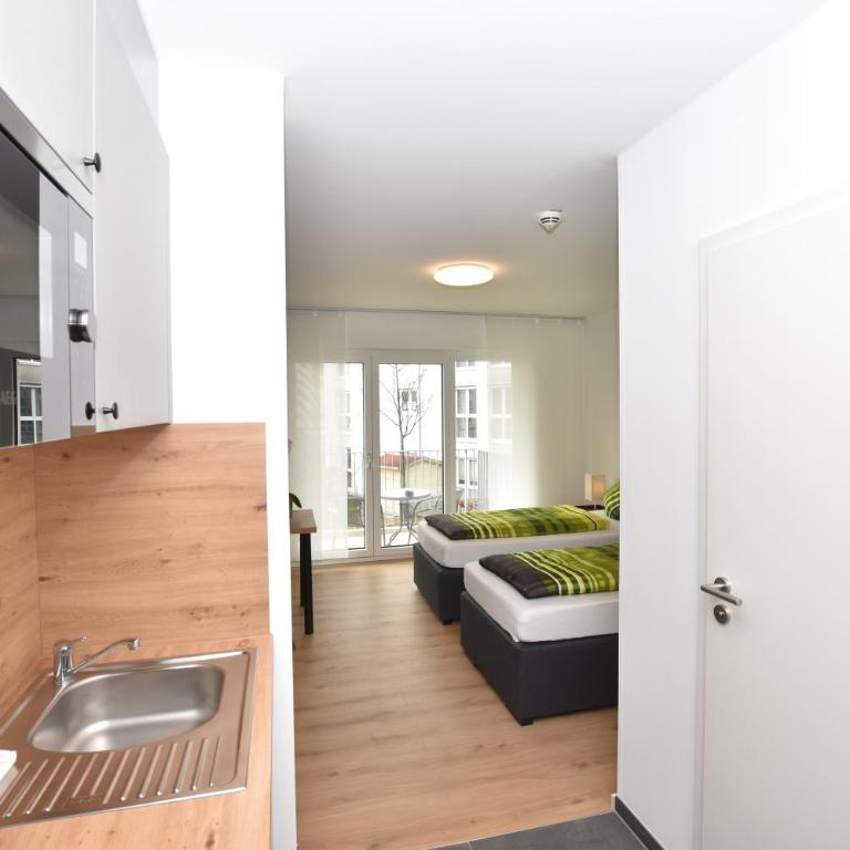Boardinghouse Henschelstraße - Doppel-/Zweibettzimmer mit Balkon - 26