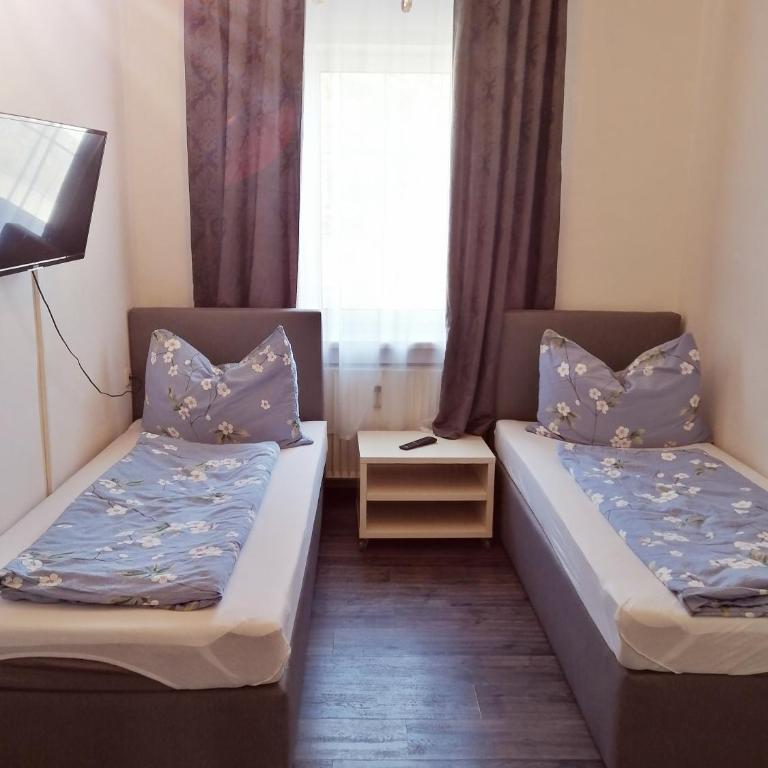 Betterhome Apartments am Stadion I Free Parking I Self Check-in - Familiensuite mit Balkon - 12