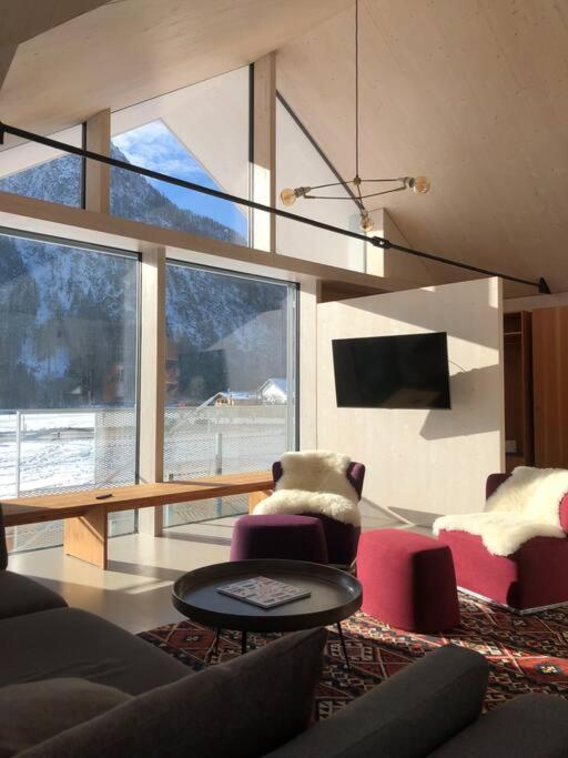 Modern Alpine Penthouse with Lake View - Ferienhaus - 84