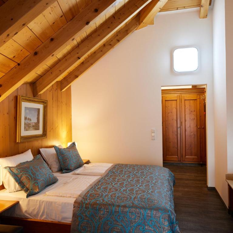Atlas Posthotel - Deluxe Doppelzimmer mit Balkon - 6
