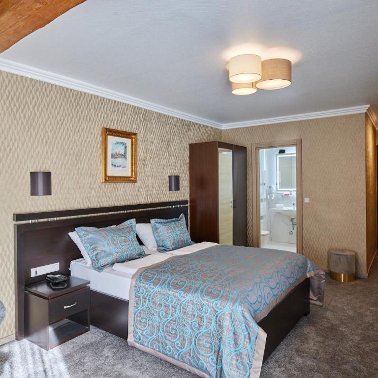 Atlas Posthotel - Deluxe Doppelzimmer mit Balkon - 7