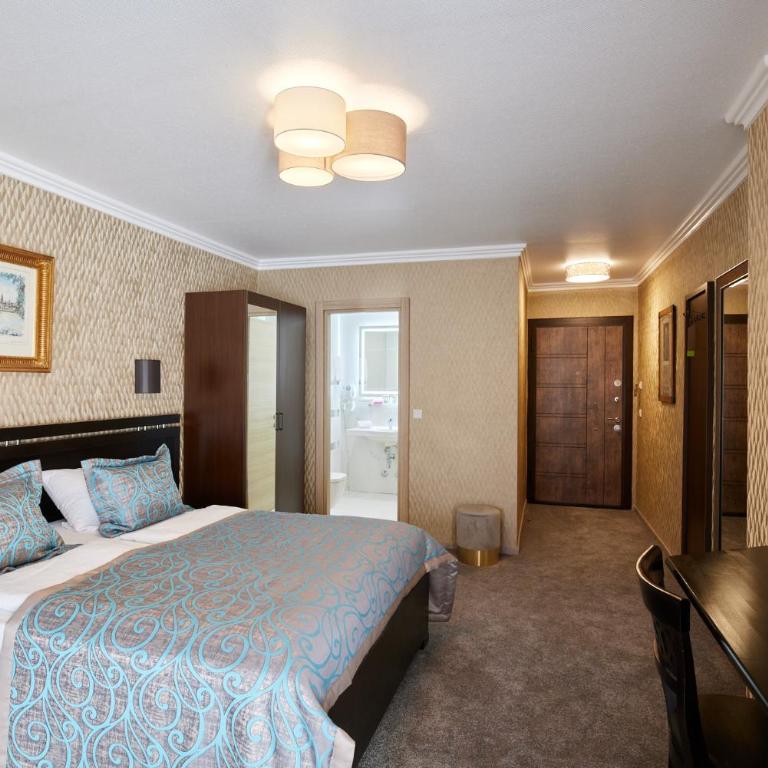 Atlas Posthotel - Deluxe Doppelzimmer mit Balkon - 8