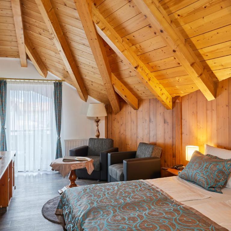 Atlas Posthotel - Deluxe Doppelzimmer mit Balkon - 5