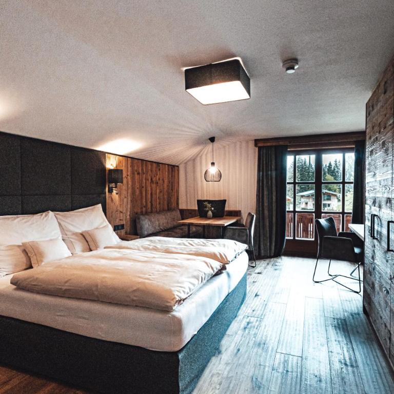Farmhotel & Chalets Grosslehen - Junior Suite mit Gartenblick - 2