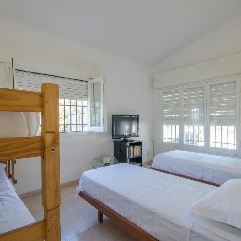 Casa en Villa Carlos Paz con Pileta , Quincho y Jardín a Pasos del Centro - Two-Bedroom House - 13